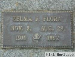 Zelma J Flora