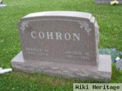 Archie M Cohron