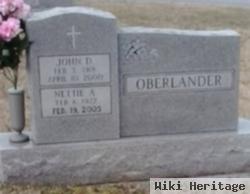 John D Oberlander