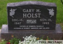 Gary M Holst