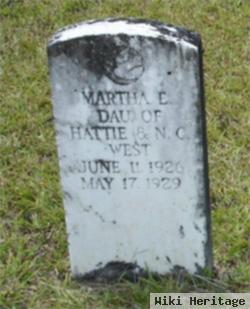 Martha E West