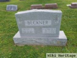 Melvin E Beckner