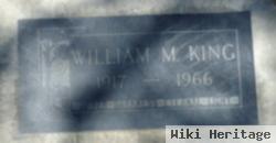 William M King