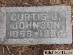 Curtis J Johnson