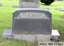 E Louise Tugman