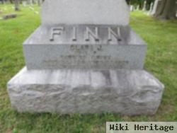 Clara J Finn