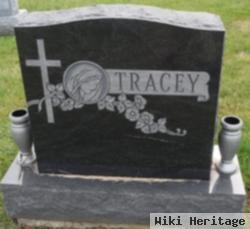 Joseph E Tracey