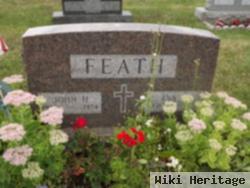 Eva L Feath