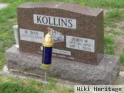 John M Kollins