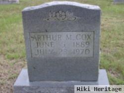 Arthur M Cox