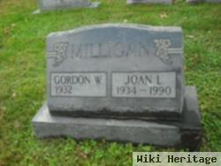 Joan L Milligan