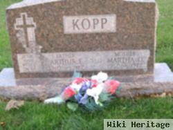 Arthur E Kopp