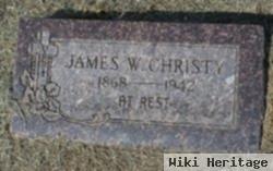 James W Christy