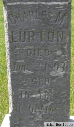 Charles M Lurton