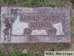 Corp Arnold E. Strenke