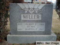 Albert E Miller