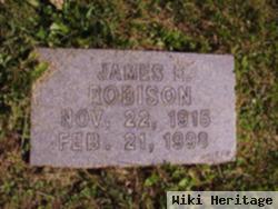 James E Robison