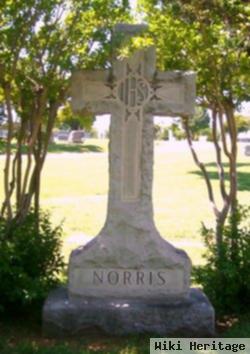 Robert E Norris