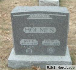 Guy E Holmes