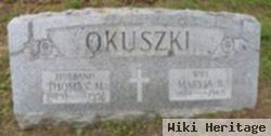 Thomas M Okuszki