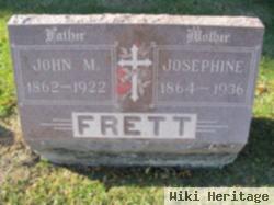 John M Frett