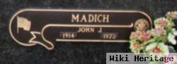 John J Madich