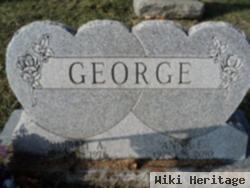 Robert A George