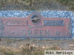 Lester E Green