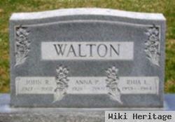 Rhia L. Walton