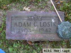 Adam C Loski