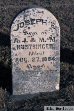 Joseph E Huntsinger