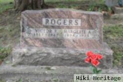 Victor E Rogers