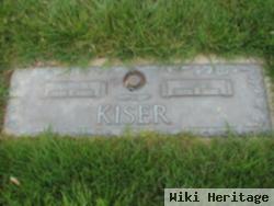 Byron E Kiser