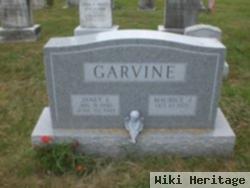 Janet E Garvine