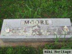 Gerald E Moore