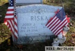 John J Riska