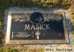 Timothy J Masick