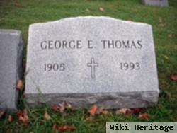 George E Thomas