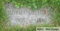 Norman L Holst