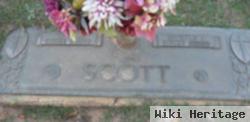 Carl E Scott