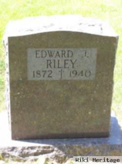 Edward J Riley