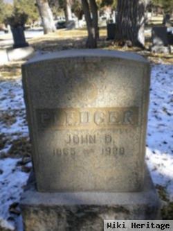 John D. Pledger