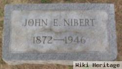 John E. Nibert