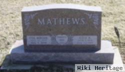 Lyle E Mathews