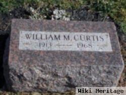 William M Curtis