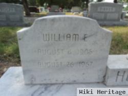 William E Holland