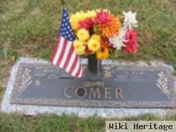 Merle G Comer