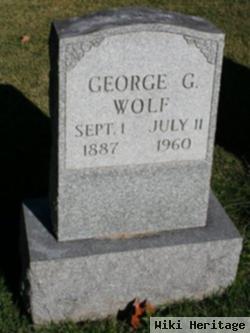 George G Wolf