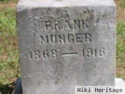 Frank E Munger