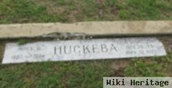 James W Huckeba